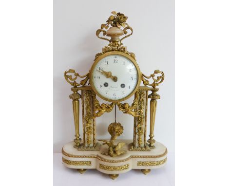 A fine 19th century gilt-metal-mounted and marble eight-day mantle clock: the finial surmount as a two-handled urn with roses