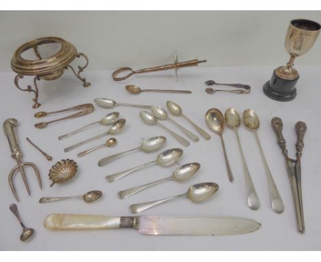 A selection of silver to include:teaspoons, long spoons and sugar tongs;a mother of pearl handled bread-knife and a bread for