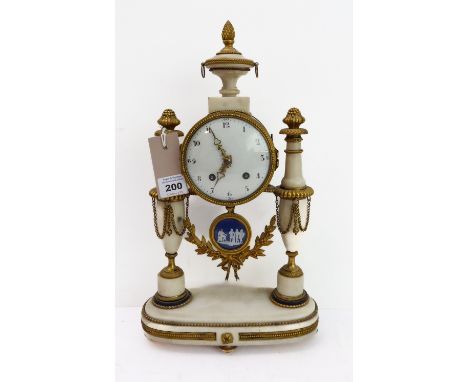 A 19th century gilt-metal-mounted and white marble eight-day French mantle clock: the white enamel dial with Arabic numerals 