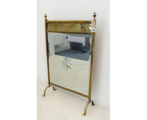A brass-framed neoclassical-style fireguard with hand-bevelled mirrorplate centrally engraved with a star motif (43.5 x 70.5 