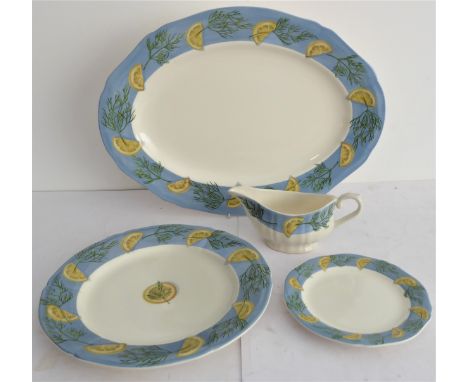 A Gien (France) 'Belle Ile' dinner service:22 x 29 cm and 24 x 18 cm plates;7 x oval platters (45 x 35.5 cm);4 sauce boats (w