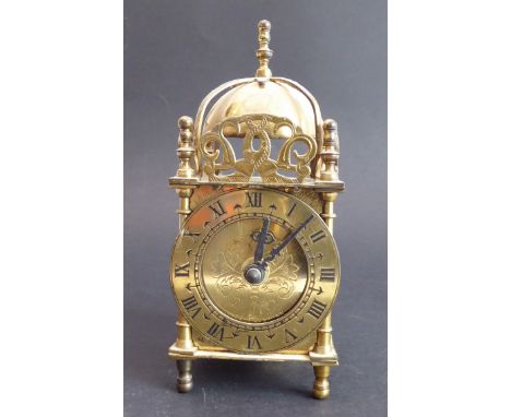 A Smiths brass lantern-style clock with quartz movement (17 cm high)