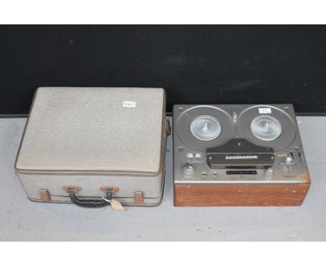 REEL TO REEL RECORDERS - a Tandberg  Model 74 reel to reel recorder in portable suitcase style case and a Tandberg Radiofabri
