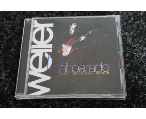 PAUL WELLER - CD copy of Weller Hit Parade signed on the cover by Paul Weller in blue marker