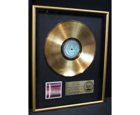 DENNY LAINE & WINGS - RIAA gold disc presented to Denny Laine to commemorate the sale of more than 500,000 copies of the CAPI
