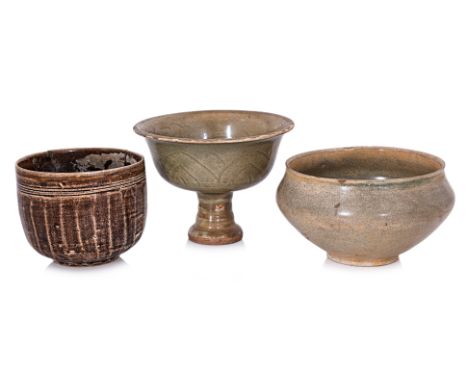 THREE SOUTHEAST ASIAN CERAMIC BOWLS
15th-17th century, Comprising; a Vietnamese squat circular stoneware bowl, with everted r