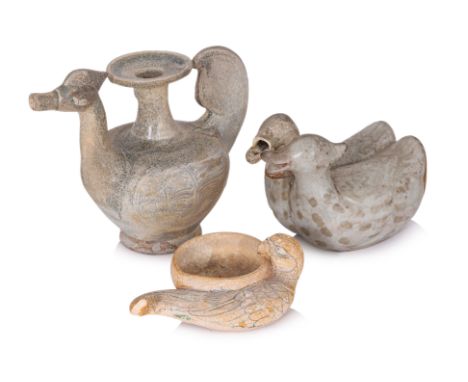 A THAI KENDI AND TWO WATER DROPPERS
Circa 15th century, Vietnamese polychrome parrot form brush washer, a Sawankhalok celadon