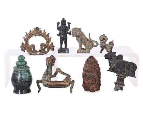 AN ASSORTMENT OF ASIAN BRONZE OBJECTS
Circa 10th century and later, cylindrical Khmer lime pot and cover, two small foo lion 