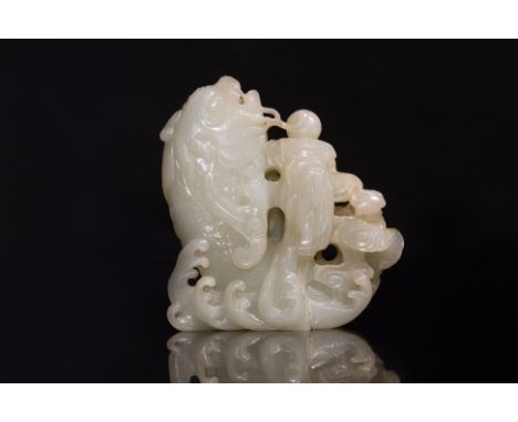 A PALE CELADON JADE CARP VASE
Well modelled as a carp leaping from crashing waves beside a pearl perched atop a rocky outcrop