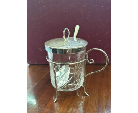 in plated framed with English silver lid, Sheffield maker JD&amp;S, together with a matching jam spoon with mother of pearl t