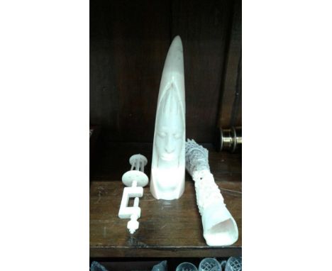 together with a similar carved thread bobbin and another similar item 