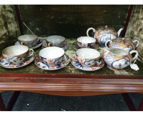 comprising of tea cups, saucers, tea pot, sugar bowl and cream jug (15) 