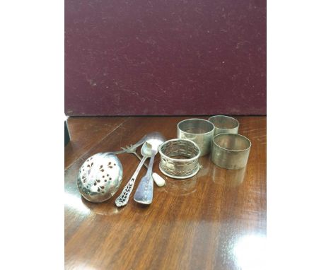 including an English silver spoon, serviette rings, pickle fork, Georgian Irish tea spoon maker Matthew West and English silv