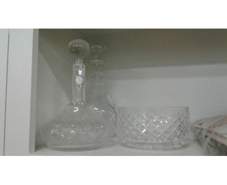 including a Waterford crystal bowl, a club shaped decanter, together with another decanter 