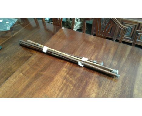comprising mahogany and brass ramrod, heavy walking stick with white metal Turks head&nbsp;cap and other examples (5) 