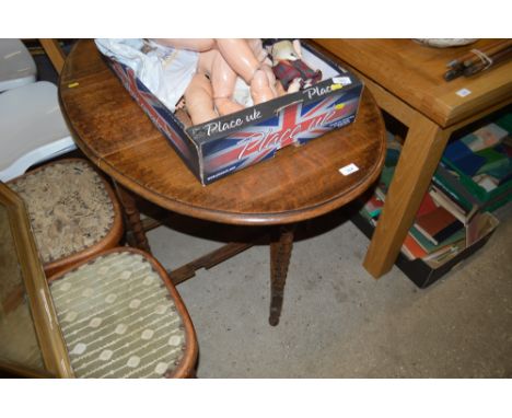 A 1930's oak barleytwist gate leg tea table