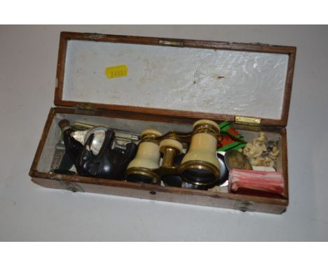 A Victorian light oak and brass bound glove box, having contents to include opera glasses, medals, penknives etc. 