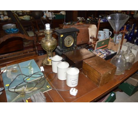 A gilded table lamp; a late Victorian mantel clock; an oak book shaped storage box; an oak card index box; and three graduate