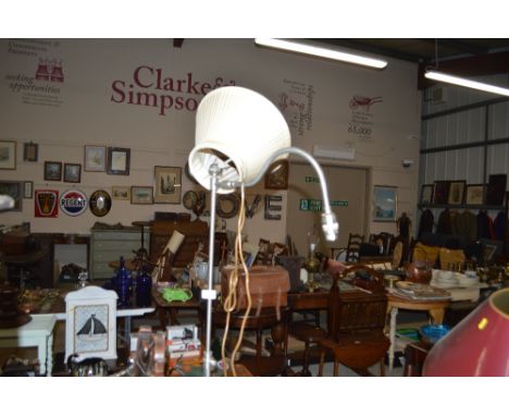 A standard lamp and shade 