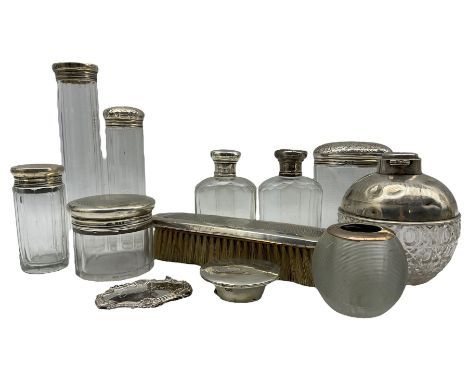 Silver mounted glass globe scent bottle Chester 1912, silver mounted glass match striker, seven glass dressing table jars wit