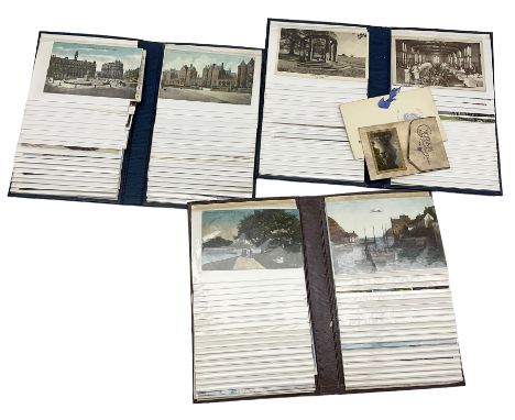 Three postcard albums and contents of vintage cards, mainly Leeds