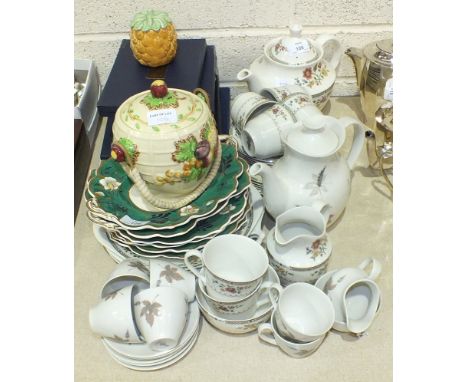 Twenty-two pieces of Royal Doulton "Kingswood" decorated tea ware, fifteen pieces of Royal Doulton "Tumbling Leaves" coffee w