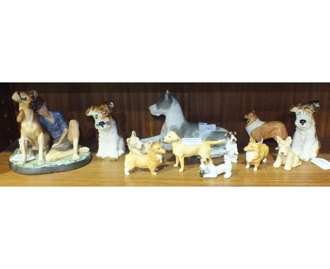 A Royal Doulton figure "Buddies" HN2546 and eleven various ceramic dog figures, including SylvaC, Beswick, etc, (some a/f).