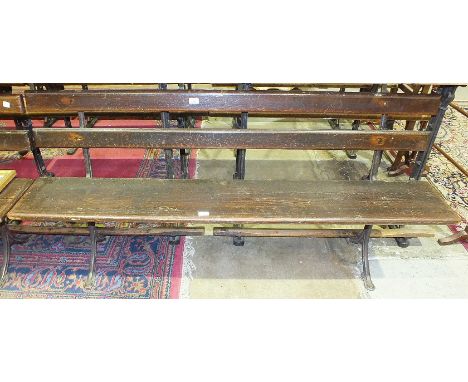 *A vintage school bench with elm seat and double-slatted back joined by a cast iron frame, 170cm wide, 77cm high.Please note 