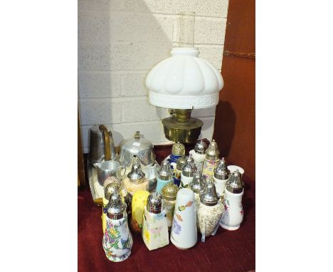A four-piece Picquot stainless steel tea service on tray, a collection of nineteen ceramic sugar sifters and a brassed oil la