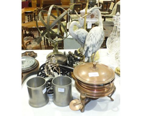 A brassed armillary sphere on circular base, 40cm high, a Late-Victorian oil lamp with opaque glass reservoir, on brass colum