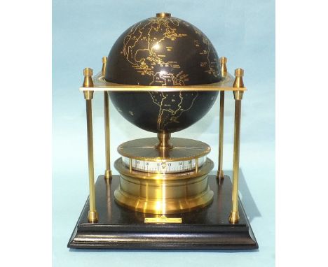 The Royal Geographical Society World Clock, the black gilded globe within a square brass platform, over a drum clock with hor