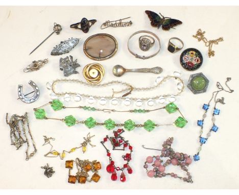 An amethyst and marcasite silver ring, various silver brooches and other jewellery.