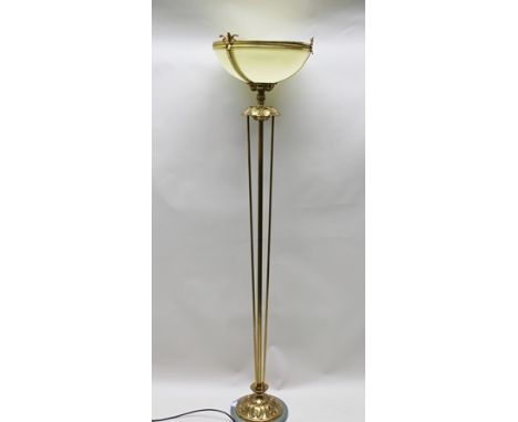 AN REGENCY DESIGN ORNATE BRASS UPLIGHTER STANDARD LAMP with acanthus leaf decoration, the bowl shade supported on a stem of r