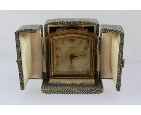 A "BAYARD LUXE" BRASS CASED CARRIAGE CLOCK, having fitted jewelled lever escapement, 7cm high, in a shagreen effect outer cas