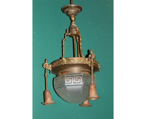 A DECORATIVE CONTINENTAL BRASS HANGING LAMP, with etched glass shade, having Greek key design, 104cm high 