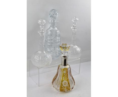 A LATE VICTORIAN BOHEMIAN PEAR FORM DECANTER, having alternate amber panels cut with floral designs alternating with ridged p