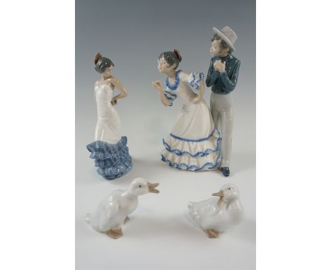 Four Nao figurines, comprising dancers and two ducks, tallest 27 cm