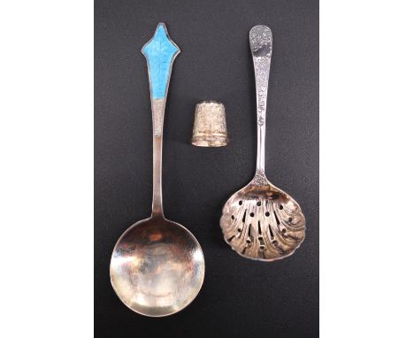 A cased Victorian silver caster spoon, Sheffield, 1900, together with a cased 1920s silver basse taille enamelled spoon and a