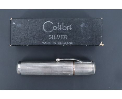 A vintage boxed silver Colbrini wheel lighter