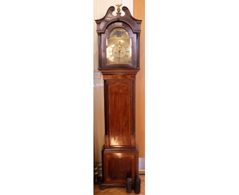 A George III long case clock by Wilkinson of Carlisle, having an 8-day movement and brass moon phase dial face with subsidiar