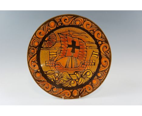 A Poole "Aegean" charger, no 54, depicting a Galleon, signed "LN", 41 cm 