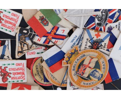 Vintage lapel badges including "Britain Navy Day", "Badge Day for British Soldiers Interned in Germany", etc