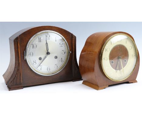 A 1940s oak mantle clock  together with a 1950s Smiths walnut mantle clock