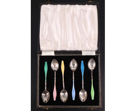 A cased set of six 1950s basse-taille harlequin enamelled silver teaspoons, having trailing ribbon decoration to the handles 