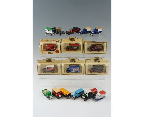 Six boxed Lledo promotional diecast toy vans and wagons together with further Lledo and Matchbox vehicles