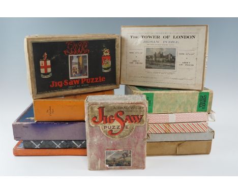 A quantity of vintage wooden Chad Valley and Victory jig-saw puzzles including "HMS Queen Elizabeth", "The Tower of London" a