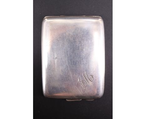 A 1920s silver matchbook case, of cushion form with engraved monogram, its interior gilt, William Hutton &amp; Sons, Birmingh