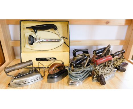 Nine various vintage electric travel irons