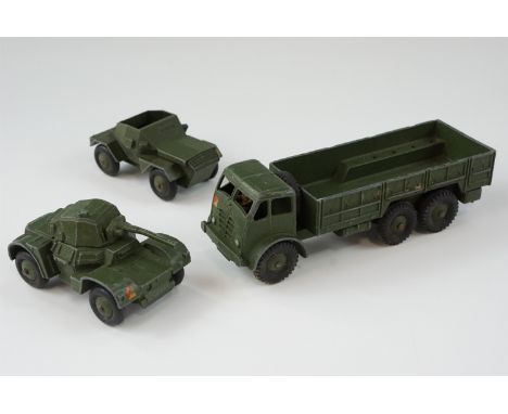 Three Dinky diecast military vehicles, comprising a 10 Ton Army Truck, a tank and one other