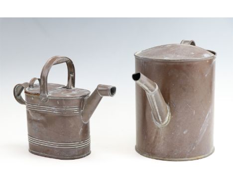 An early 20th Century copper hot water carrying can together with a vintage watering can, tallest 22 cm